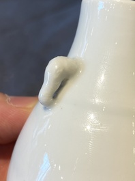 A small Chinese Dehua blanc de Chine elephant-handled 'hu' vase, 18th C.