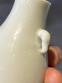 A small Chinese Dehua blanc de Chine elephant-handled 'hu' vase, 18th C.