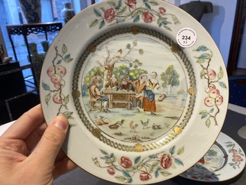 A pair of Chinese famille rose plates with peasants playing cards in the style of the painter David Teniers II, Qianlong