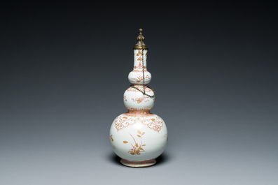 A Chinese iron-red and gilt-decorated triple gourd vase, Kangxi