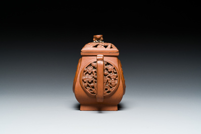 A Chinese reticulated double-walled Yixing stoneware teapot and cover, Kangxi