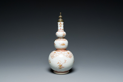 A Chinese iron-red and gilt-decorated triple gourd vase, Kangxi