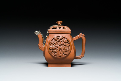 A Chinese reticulated double-walled Yixing stoneware teapot and cover, Kangxi