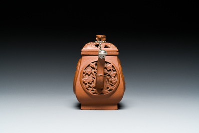 A Chinese reticulated double-walled Yixing stoneware teapot and cover, Kangxi