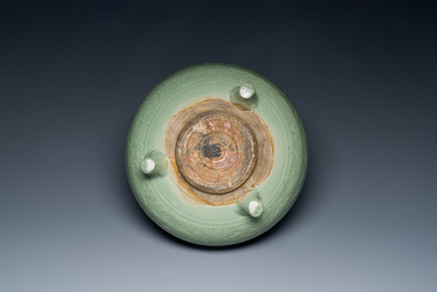 A Chinese Longquan celadon tripod censer with underglaze decoration, Ming