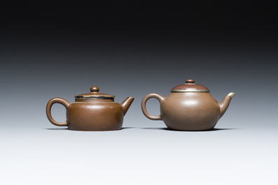 Two Chinese Yixing stoneware teapots and covers with brass mounts, one with Yigong 逸公 seal mark, 19/20th C.