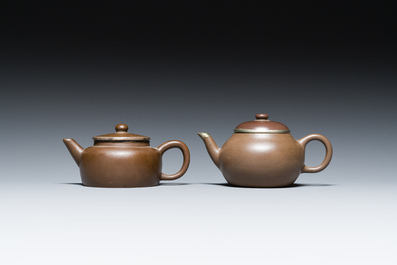 Two Chinese Yixing stoneware teapots and covers with brass mounts, one with Yigong 逸公 seal mark, 19/20th C.