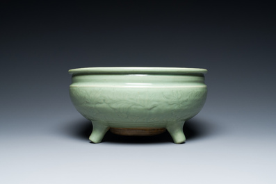 A Chinese Longquan celadon tripod censer with underglaze decoration, Ming
