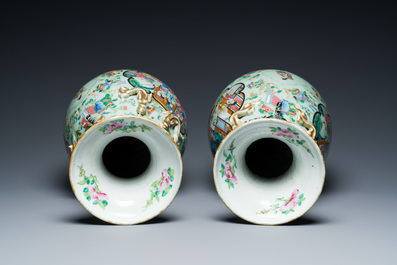 A pair of Chinese Canton famille rose celadon-ground vases, 19th C.