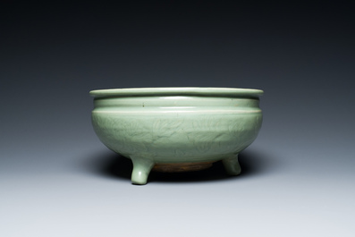 A Chinese Longquan celadon tripod censer with underglaze decoration, Ming