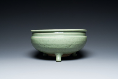 A Chinese Longquan celadon tripod censer with underglaze decoration, Ming