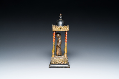 An Italian carved wood figure of a monk mounted in a later pagoda, 14th and 19th C.