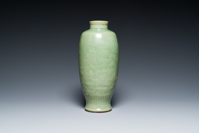A Chinese Longquan celadon vase with underglaze floral design, Ming