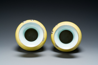 A pair of Chinese famille rose yellow sgraffiato ground 'sages' vases, Qianlong mark, Republic