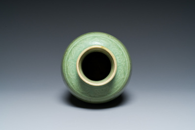 A Chinese Longquan celadon vase with underglaze floral design, Ming