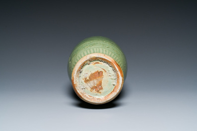 A Chinese Longquan celadon vase with underglaze floral design, Ming