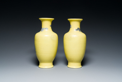 A pair of Chinese famille rose yellow sgraffiato ground 'sages' vases, Qianlong mark, Republic
