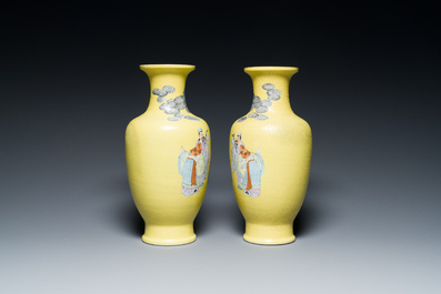 A pair of Chinese famille rose yellow sgraffiato ground 'sages' vases, Qianlong mark, Republic