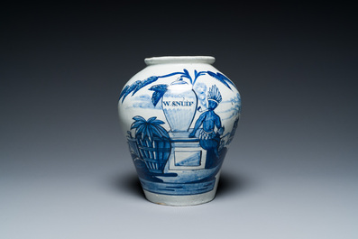 A Dutch Delft blue and white 'VOC' tobacco jar with an Indian and inscribed 'W.Snuif', 18th C.