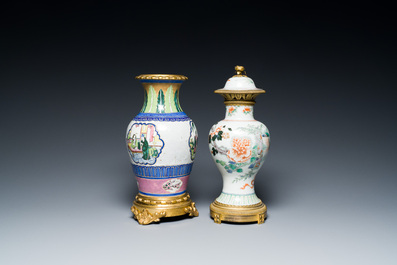 A Chinese famille verte vase and an enamelled Yixing stoneware vase with gilt bronze mounts, 19th C.