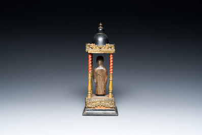 An Italian carved wood figure of a monk mounted in a later pagoda, 14th and 19th C.