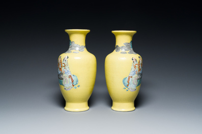 A pair of Chinese famille rose yellow sgraffiato ground 'sages' vases, Qianlong mark, Republic