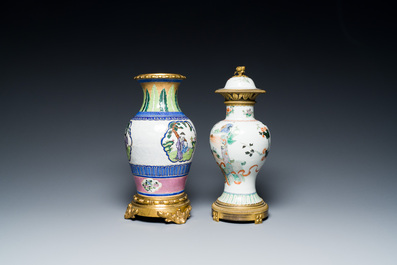 A Chinese famille verte vase and an enamelled Yixing stoneware vase with gilt bronze mounts, 19th C.