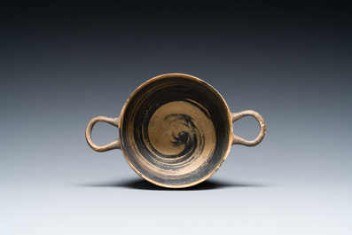 A Greek kylix with a swan and a skyphos with an owl, Apulia, Italy, ca. 4th C. b.C