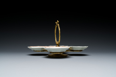 Four Japanese Kakiemon-style octagonal dishes in a brass mount, Edo, 18th C.
