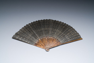 A large Chinese bamboo fan with a 'Water Margin' scene in ink and colours on black paper, Canton, 19th C.