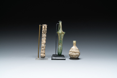 Two Roman glass balsamariums and a flask, 2nd/4th C.