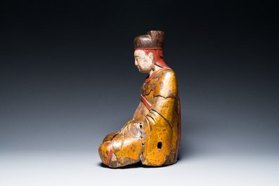 A Chinese or Vietnamese lacquered and gilt wood sculpture of Buddha, 16/17th C.