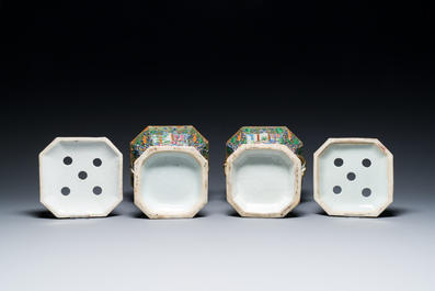 A pair of Chinese Canton famille rose flower holders and covers, 19th C.