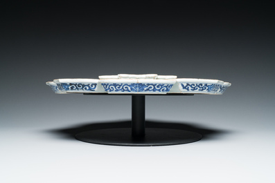 An exceptional Chinese blue and white nine-piece sweetmeat set, Kangxi