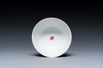 A Chinese famille rose ruby-pink-ground 'pheasants' cup and saucer, Yongzheng