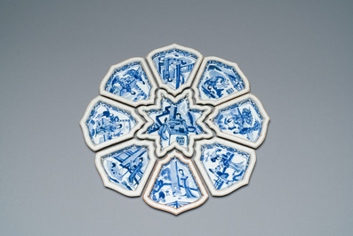 An exceptional Chinese blue and white nine-piece sweetmeat set, Kangxi