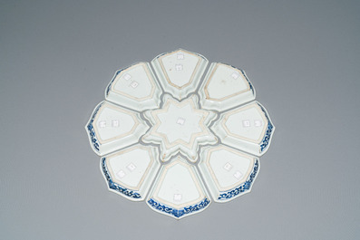 An exceptional Chinese blue and white nine-piece sweetmeat set, Kangxi