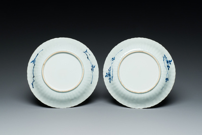 A pair of Chinese blue and white plates with the arms of the De Pinto family for the Portuguese market, Kangxi