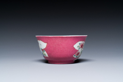 A Chinese famille rose ruby-pink-ground 'pheasants' cup and saucer, Yongzheng