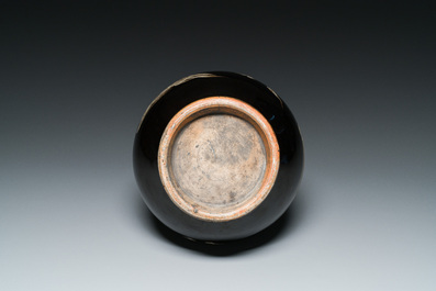 A Chinese black-glazed reverse-decorated bottle vase, 19th C.