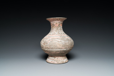 A Chinese polychrome painted pottery vase, Han