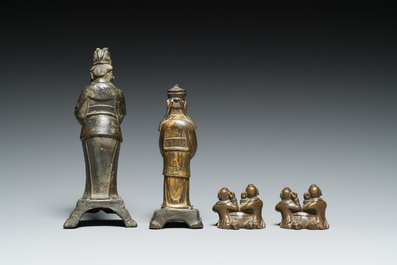 Two Chinese bronze sculptures and two paper- or scrollweights in the shape of boys playing the drums, Ming/Qing