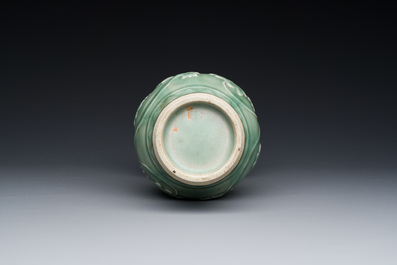 A Chinese Longquan celadon 'peony scroll' vase, Yuan