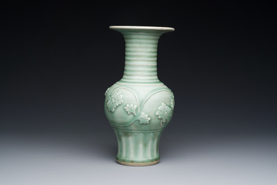 A Chinese Longquan celadon 'peony scroll' vase, Yuan