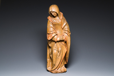 A Flemish walnut sculpture of Mary, 16th C.