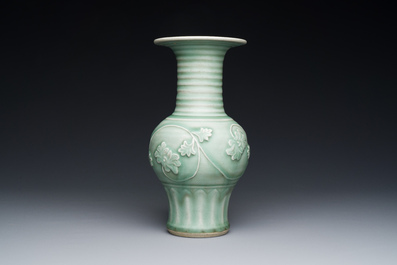 A Chinese Longquan celadon 'peony scroll' vase, Yuan
