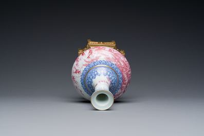 A Chinese blue-and-puce-enamelled bottle vase with a gilt bronze mount, 20th C.