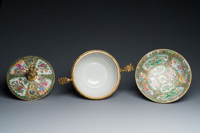 A Chinese Canton famille rose bowl and cover with fine gilt mounts and a bowl mounted on a gilt foot, 19th C.