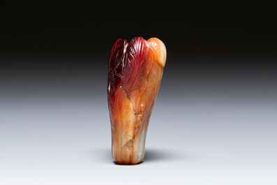 A small Chinese white and russet jade 'cabbage' vase, 19th C.