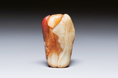 A small Chinese white and russet jade 'cabbage' vase, 19th C.